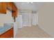 Bright kitchen featuring wood cabinets, tile floors and standard appliances at 3790 Ne 22Nd Ave, Ocala, FL 34479