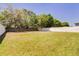 Spacious backyard with lush grass and a privacy fence, perfect for outdoor activities and relaxation at 3812 Creswick Cir, Orlando, FL 32829
