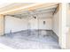 Spacious two-car garage with concrete block walls, water heater, and an automatic door opener at 3812 Creswick Cir, Orlando, FL 32829