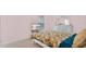 This bedroom features a bed, dresser, and TV for relaxation and entertainment at 4 Starling Dr, Daytona Beach, FL 32117