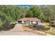 Inviting single-Gathering home with a lush front yard and classic white exterior at 4 Starling Dr, Daytona Beach, FL 32117