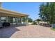 Enjoy an outdoor space with a covered patio, a brick paver patio, and a well-manicured lawn at 4113 Longbow Dr, Clermont, FL 34711