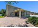 This home has a covered patio and an expansive brick paver patio, perfect for outdoor enjoyment at 4113 Longbow Dr, Clermont, FL 34711