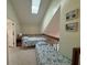 Bedroom on loft featuring two twin beds, skylight, and nautical decor at 4244 Sun Village Ct # 160, New Smyrna Beach, FL 32169