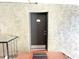 Condo entrance showing door number 203 on a textured wall at 455 Wymore Rd # 203, Altamonte Springs, FL 32714