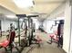 A spacious community fitness center with various weight machines and equipment at 455 Wymore Rd # 203, Altamonte Springs, FL 32714