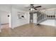 Open-concept living room with tile flooring and stairs to the upper level at 4584 Pheasant Run Dr # B, Orlando, FL 32808