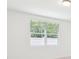 Bright bedroom with large window and blinds; perfect for relaxation and comfort at 4713 Jasmine Cir, Leesburg, FL 34748