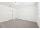 Neutral bedroom with closet space and neutral walls and flooring for a calm feel at 4713 Jasmine Cir, Leesburg, FL 34748