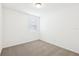 Clean bedroom with neutral carpet and natural light from a window at 4713 Jasmine Cir, Leesburg, FL 34748