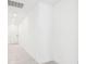 Bright hallway with tile floors and recessed lighting leading to the home's interior at 4713 Jasmine Cir, Leesburg, FL 34748