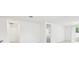 Hallway leading to a bedroom or living space featuring tile and carpet flooring at 4717 Jasmine Cir, Leesburg, FL 34748