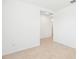 Bright living room with neutral tile flooring and freshly painted white walls at 4717 Jasmine Cir, Leesburg, FL 34748