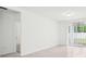 Bright living room with access to a patio and an open layout at 4717 Jasmine Cir, Leesburg, FL 34748