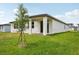 Enjoy outdoor living with a spacious backyard and lush lawn at 4728 Jasmine Cir, Leesburg, FL 34748