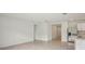 Spacious living room with tile flooring providing a blank canvas for personalization and enjoyment at 4728 Jasmine Cir, Leesburg, FL 34748