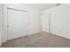 Bedroom featuring a closet and a connecting door at 4732 Jasmine Cir, Leesburg, FL 34748