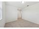 Bright bedroom featuring tile flooring and neutral paint, ready for personalization at 4732 Jasmine Cir, Leesburg, FL 34748