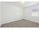 Bright bedroom with neutral carpet and a window providing natural light at 4732 Jasmine Cir, Leesburg, FL 34748