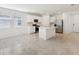 Bright and airy kitchen with modern appliances and an island making for a desirable cooking and gathering space at 4732 Jasmine Cir, Leesburg, FL 34748