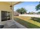 Backyard featuring a covered patio and spacious lawn at 5537 Misty Woods Dr, Oviedo, FL 32765