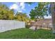 A fenced backyard offers green space at 600 Rob Roy Dr, Clermont, FL 34711