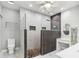Modern bathroom featuring a spacious walk-in shower with mosaic tile and glass partition at 600 Rob Roy Dr, Clermont, FL 34711