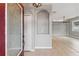 Inviting entryway showcasing tile flooring, a decorative niche, and a glimpse into the open-concept living space at 600 Rob Roy Dr, Clermont, FL 34711