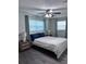 Comfortable bedroom with neutral decor, modern furnishings, and soft natural light at 637 Ash Ave, Daytona Beach, FL 32117
