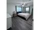 Serene bedroom featuring modern furnishings, neutral color scheme, and ample natural light at 637 Ash Ave, Daytona Beach, FL 32117