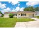Charming home with a well-maintained lawn, neat landscaping, and inviting curb appeal at 6426 Sw 60 Ave, Ocala, FL 34474