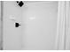 Clean, tiled shower featuring black fixtures and a convenient soap dish at 6426 Sw 60 Ave, Ocala, FL 34474