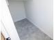 Compact closet space features tiled floor, built-in shelf, and plenty of room at 6442 Pine Warbler Way, St Cloud, FL 34771
