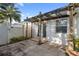 Private backyard patio area with trellis covering at 655 Eagle Pointe South, Kissimmee, FL 34746