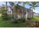 Charming home featuring a wooden pergola with climbing plants at 655 Eagle Pointe South, Kissimmee, FL 34746