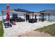 Lovely backyard with patio area offering space for relaxation and gatherings at 6935 Dilly Lake Ave, Groveland, FL 34736