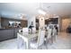 Open layout with views from the dining room into the kitchen and living area at 6935 Dilly Lake Ave, Groveland, FL 34736