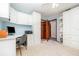 Bedroom featuring a built-in desk, wardrobe, and wood door that leads to other areas at 71 Lazy Eight Dr, Port Orange, FL 32128