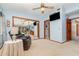 Comfortable bedroom with a large mirror, a recliner, and ample closet space at 71 Lazy Eight Dr, Port Orange, FL 32128