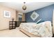 Stylish bedroom with unique lighting, decorative accents, and cozy furnishings, creating a personal space at 71 Lazy Eight Dr, Port Orange, FL 32128