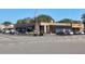 Commercial building featuring outdoor seating and ample parking, easily accessible to patrons at 71 Lazy Eight Dr, Port Orange, FL 32128