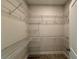 Spacious walk-in closet with ample shelving and storage space at 738 Pointe Emerson Blvd, Apopka, FL 32703