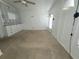 Spacious bedroom featuring built-in storage and a door leading to the outside at 741 Truman Ave, Lady Lake, FL 32159