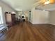 Open living room with wood floors, plenty of light, and an open floorplan at 741 Truman Ave, Lady Lake, FL 32159