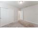 Bedroom featuring carpeting and a double door closet for storage at 849 Teton St, Haines City, FL 33844