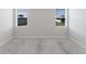 Cozy bedroom filled with natural light from two large windows at 849 Teton St, Haines City, FL 33844