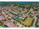 Planned community featuring pools, tennis courts, playgrounds, manicured lawns, and mature trees at 8625 Brixford St, Orlando, FL 32836