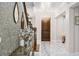 Grand foyer with a chandelier, marble floors, and a stylish console table at 8625 Brixford St, Orlando, FL 32836