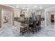 Kitchen view with a large island and modern stainless steel appliances at 8625 Brixford St, Orlando, FL 32836
