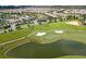 Stunning aerial view of the golf course and beautiful community with lush landscaping and well-maintained homes at 9179 Sommerset Hills Dr, Davenport, FL 33896